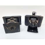 A Vollenda folding camera, and an Eastman Kodak folding camera (2) Provenance: Part of a vast single