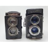 A Voigtlander box camera and a Toyocaflex box camera (2) Provenance: Part of a vast single owner