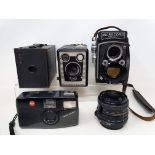 A Microcord box camera, Kodak No 2 Brownie box camera, a Kodak Brownie Model C box camera and