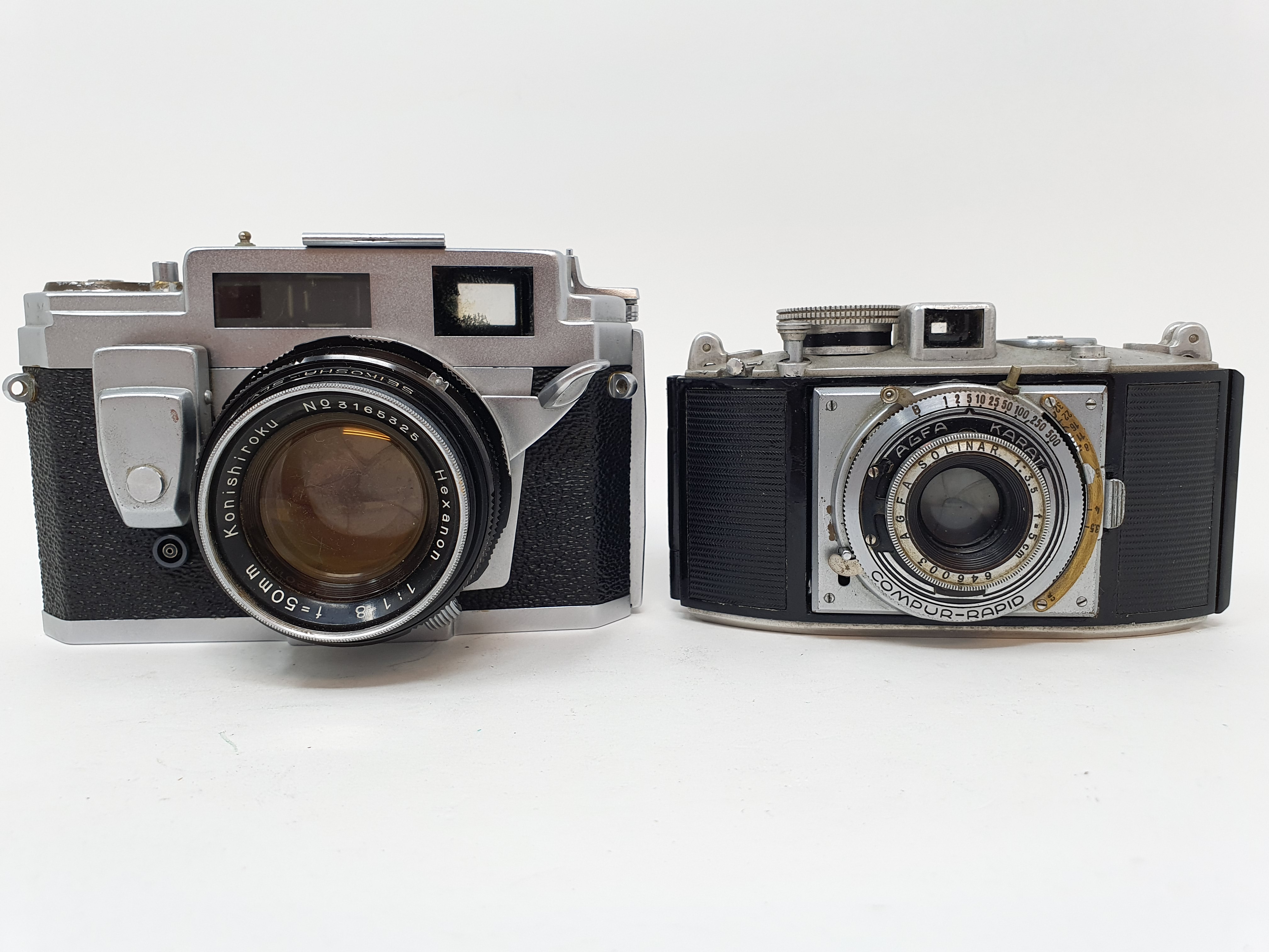 A Konica III M camera, serial number 419754, and an Agfa camera (2) Provenance: Part of a vast