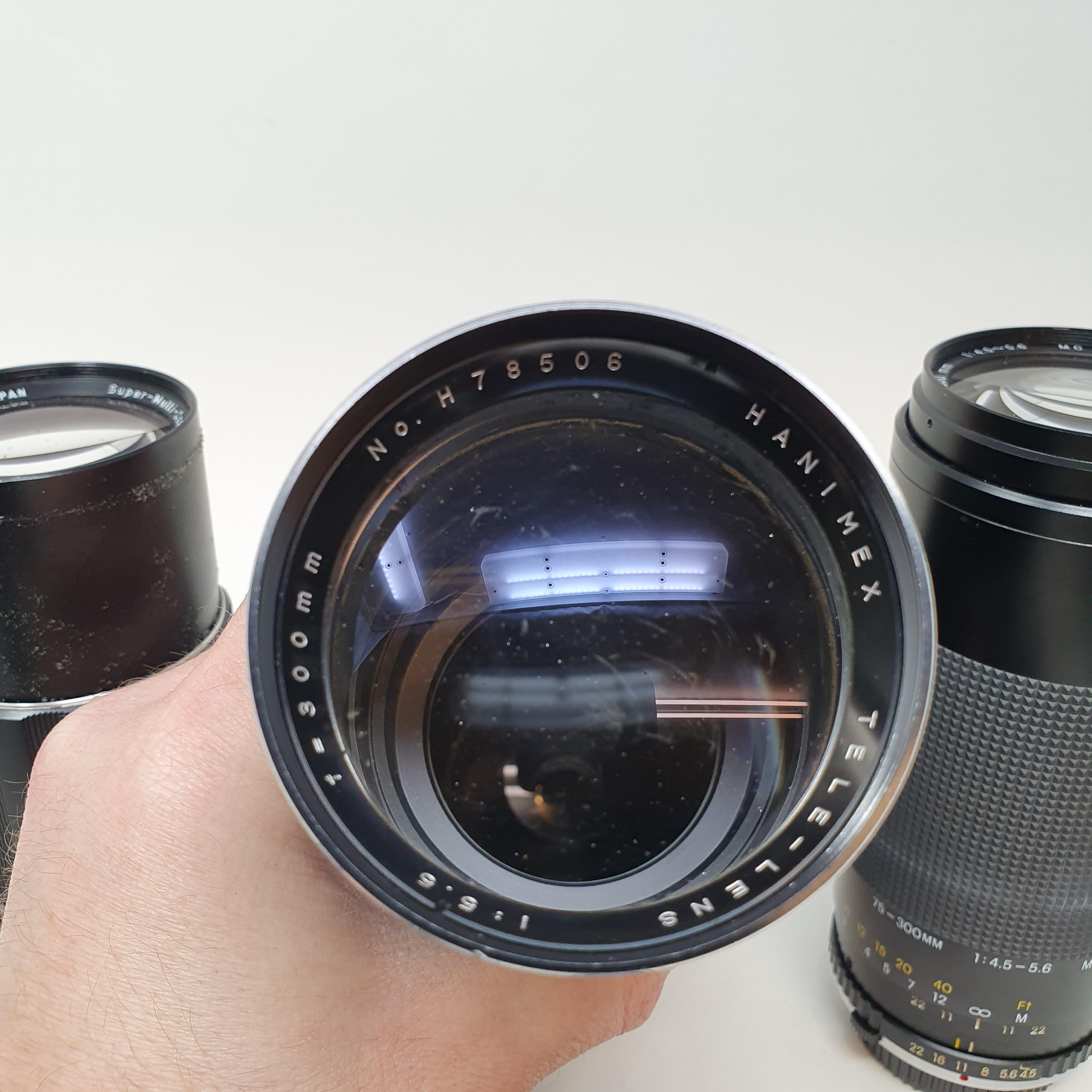 A Carl Zeiss Jena camera lens, in leather outer case, and three other camera lenses (box) - Image 5 of 7