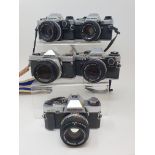 An Olympus OM-10 camera, two other OM-10s an Olympus OM-20 and an Olympus OM-1 (5) Provenance: