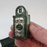 A Coronet Midget green bakelite miniature camera, in leather outer case Provenance: Part of a vast