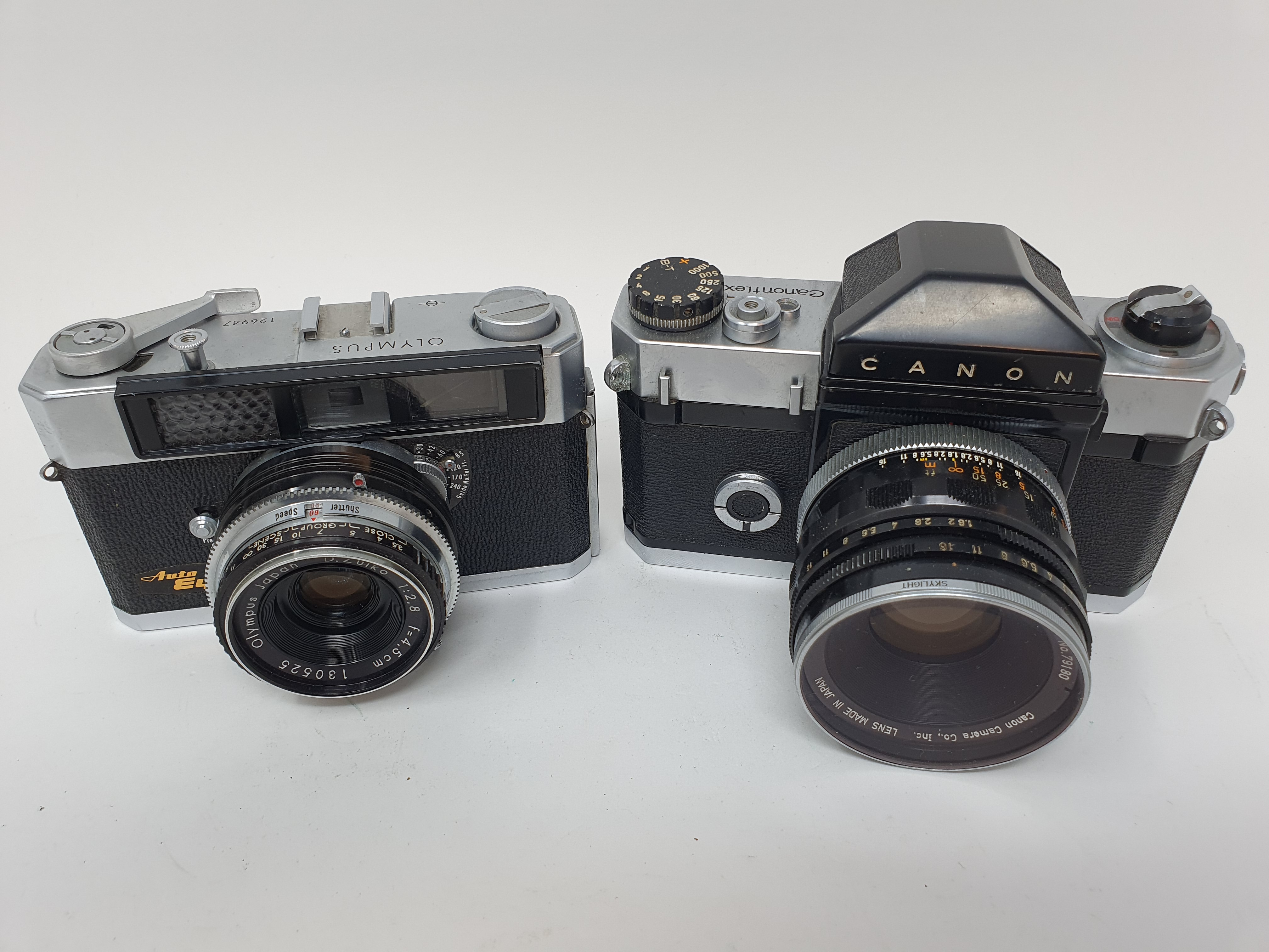 An Olympus camera, serial number 126947 and a Canon Canonflex camera (2) Provenance: Part of a - Image 2 of 4