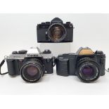 A Minolta SR-7 camera, a Canon T50 camera and a Konica FT-1 camera (3) Provenance: Part of a vast