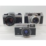 An Olympus-35 EC camera, a Leidolf Lordomatic camera and a Voigtlander VSL 3-E camera (3)