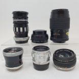 A Nikon camera lens, six other lenses, and other items (box) Provenance: Part of a vast single owner