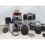 An Exakta Varex IIa camera, a Pentax Spotmatic F camera and various assorted photography items (box)