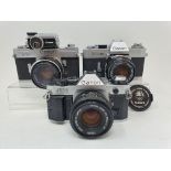 A Canon FP camera, a Canon EX Auto, and a Canon AE-1 camera (3) Provenance: Part of a vast single