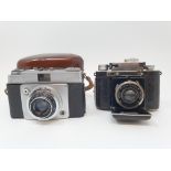 A Certo Dolltna folding camera, and an Ilford Sportsman camera, with leather outer case (2)