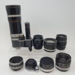 A Kern Paillard camera lens, and nine other lenses (box) Provenance: Part of a vast single owner