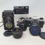 A Rolleicord box camera, a Pentax KX camera and various assorted photography items (box)