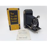 A Kodak Junior Six-20 folding camera, in original box Provenance: Part of a vast single owner