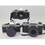 An Asahi Pentax K1000 camera, a Pentax ME Super camera, and a Pentax MG camera (3) Provenance: