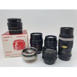 A Leitz camera lens, boxed, five other camera lenses, and other accessories (box) Provenance: Part