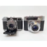 A Zeiss Ikon Tenax camera, and a Zeiss Ikon Contessa folding camera (2) Provenance: Part of a vast