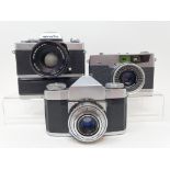A Zeiss Ikon contaflex camera, a Minolta XG9 camera and a Petri 7S camera (3) Provenance: Part of