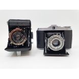 An Agfa Isolette folding camera, and a Zeiss Ikon camera, with outer case (2) Provenance: Part of