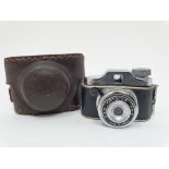 A Crystar miniature camera, in outer leather case Provenance: Part of a vast single owner collection