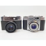 A Zeiss Ikon Contina camera, and a Zeiss Ikon Contina LK camera (2) Provenance: Part of a vast