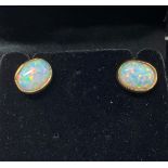 A pair of 9ct gold and opal stud earrings Modern