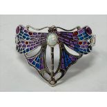 A silver, opal, ruby and sapphire dragonfly bangle Modern