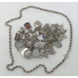 A silver charm bracelet and charms, and a silver chain (2) All in weight 73.6g