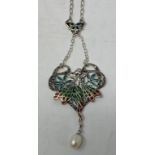 A silver plique-a-jour nymph necklace, set with pearl and marcasite