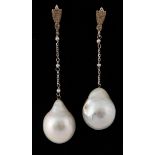A pair of cultured pearl drop earrings