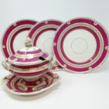 A 19th century part dinner service, with a rope border, puce ground highlighted in gilt,