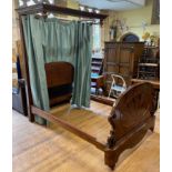 A mahogany half tester bed, 236 cm high x 145 cm wide Various pieces missing, losses, variation of