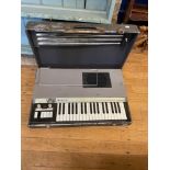 A Mini Gem keyboard, in a folding case This lot is from a vast collection of vintage radios,