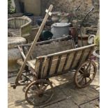 A wooden dog cart, 100 cm wide Stored outside, in need of extensive restoration, see images