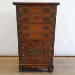 A Korean chest, having three drawers and two cupboard doors, 54 cm wide