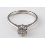 An 18ct white gold and single stone diamond ring, approx. 72 points, ring size J