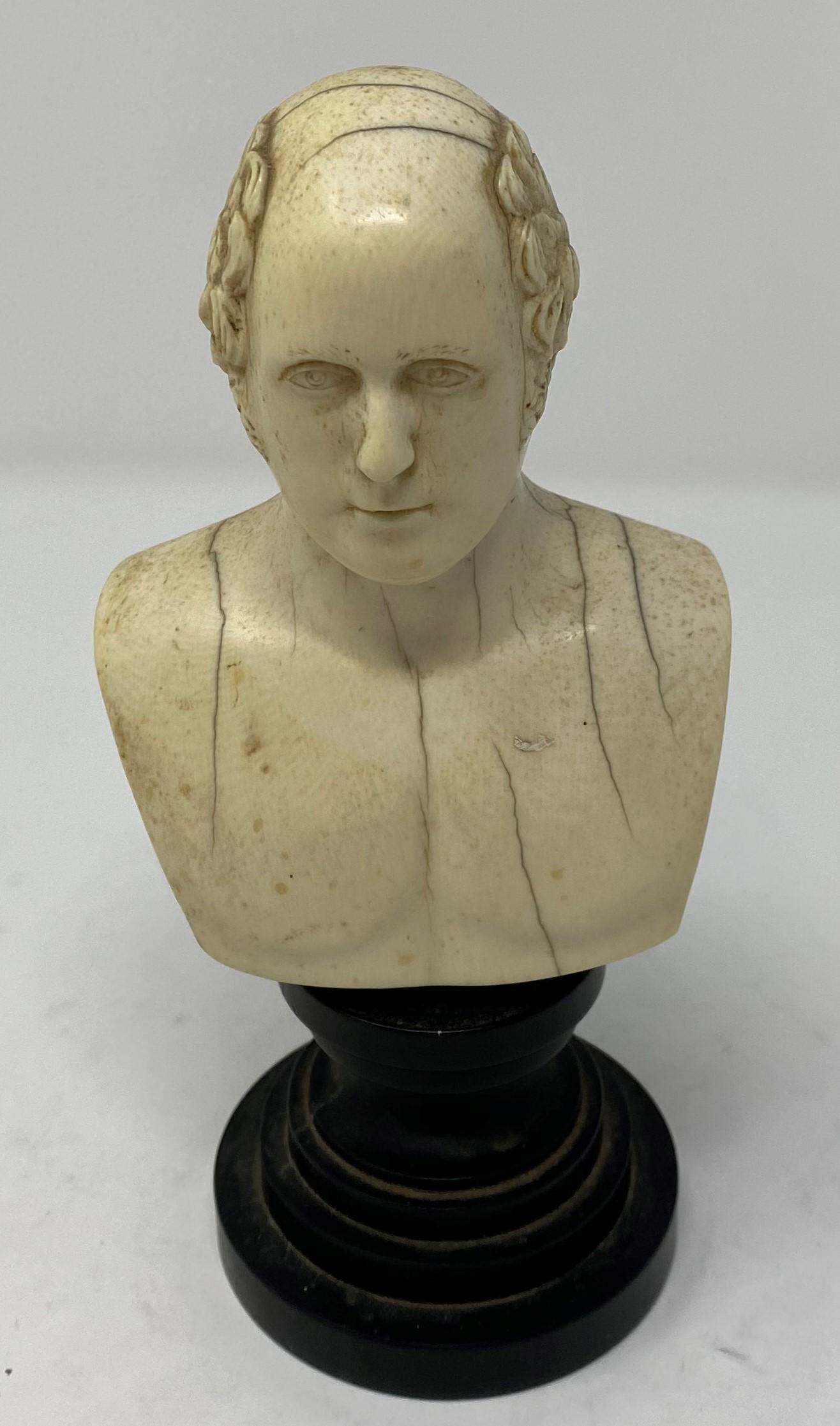 An early 19th century English carved ivory bust, of a gentleman, inscribed Kelly, Sculpt 1818, 10.