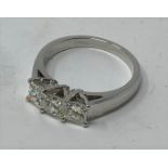 An 18ct white gold and three stone princess cut diamond ring, ring size K Diamonds approx. 1.00ct