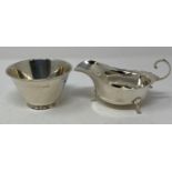A silver sauce boat, Chester 1918, and a silver sugar bowl, 6.4 ozt (2)