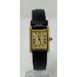 A ladies silver gilt Must De Cartier wristwatch, with paperwork no sound, no second hand to see