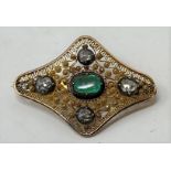 A 19th century emerald and diamond brooch 4 x 2.5 cm and all in weight of 6.3 g