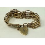 A 9ct gold gatelink bracelet, with a padlock clasp, 22.9 g