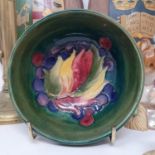 A Moorcroft Pottery Leaf and Berry pattern bowl, paper label, 11 cm diameter, other ceramics,