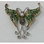 A silver and plique-a-jour butterfly pendant/brooch set with pearl rubies and marcasite