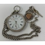A silver open face pocket watch, and a silver Albert