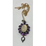 A silver, 9ct gold, moonstone, amethyst and diamond necklace Modern