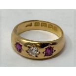 An 18ct gold, ruby and diamond ring, ring size K All in weight 5.4 g