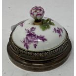 A French porcelain and silver coloured metal mounted bell push, with floral decoration, the flower