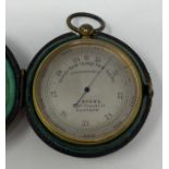 A compensated pocket barometer, the silvered dial signed J. Brown, Glasgow, with a travelling