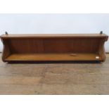 An oak wall shelf, 101 cm wide