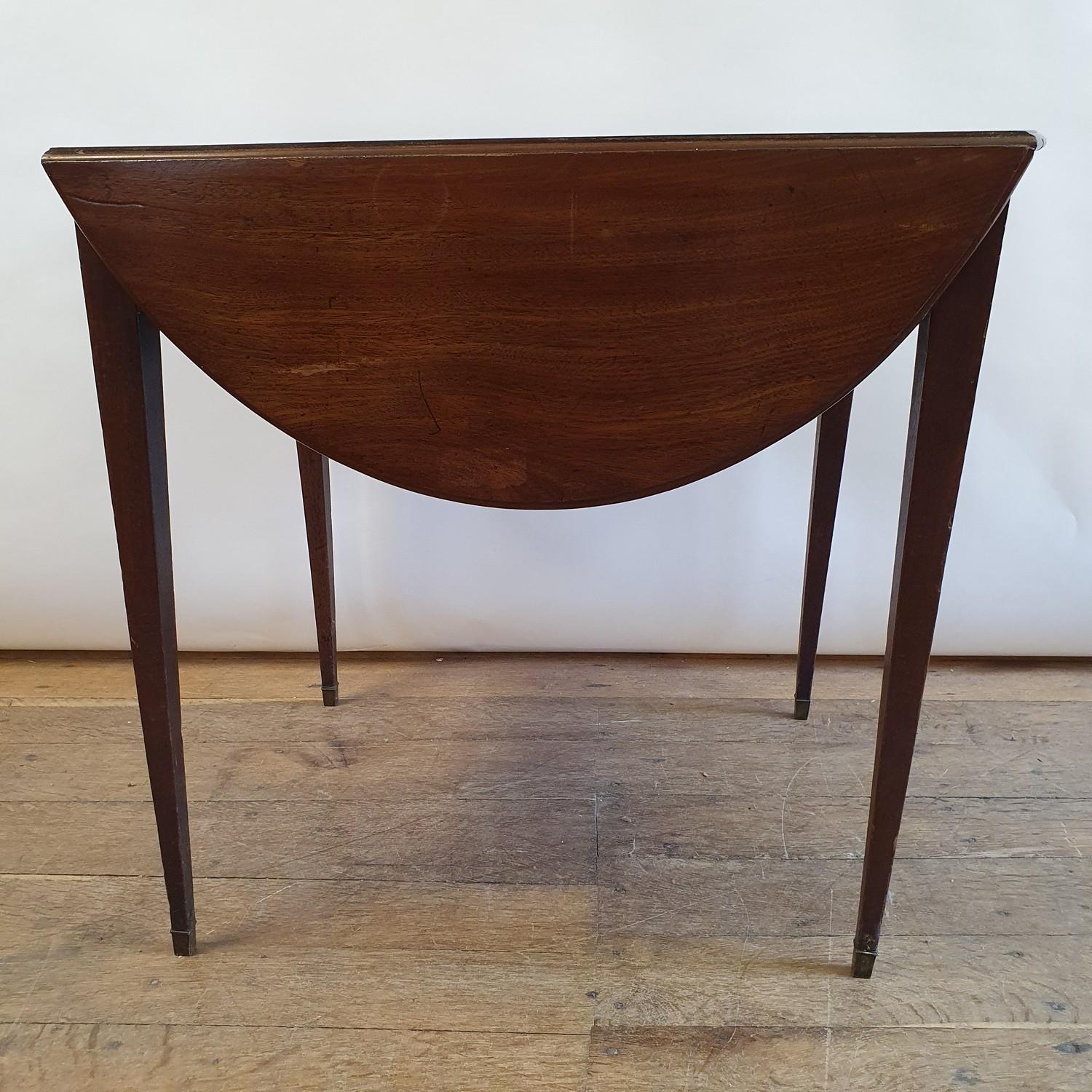 A 19th century mahogany Pembroke table, 80 cm wide Top with three splits, variation of colour, the